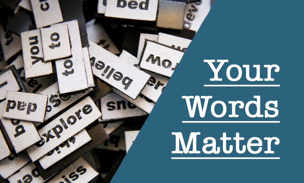 A variety of word magnets in a pile and beside it is the phrase Your Words Matter written in a typewriter font and underlined.